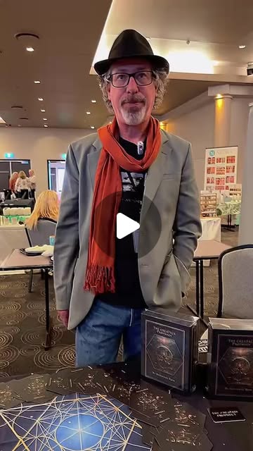 Benjamin Rose standing behind the Creatrix cards and box sets.